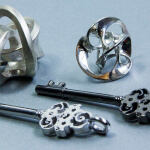 Silver 3D printed objects with the difference finishes Thumbnail